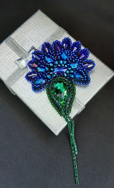 Embroidered handmade beaded brooch, exclusive handmade, brooch with beads flower blue cornflower. Fashion accessory. Bright and unique jewellery that will decorate any outfit. materials:  beads, sequins, rhinestones, crystal beads, reverse side leather in a gift box SIZE: 2.4 in*2.4 in (6 cm*6 cm) Packaged safely and dispatched within 1-2 working day. Welcome to my store, https://zavitokua.etsy.com where I showcase an exclusive collection of 100% handmade creations. I am pleased to offer custom Handmade Blue Brooches For Party, Embellished Blue Jewelry As Gift, Blue Embellished Jewelry Gift, Bead Flower, Brooch Flower, Beads Flower, Blue Cornflower, Flower Blue, Beaded Brooch