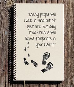 a notepad with a hand and footprints on it that says many people will walk in and out of your life, but only true friends will leave footprints in your heart