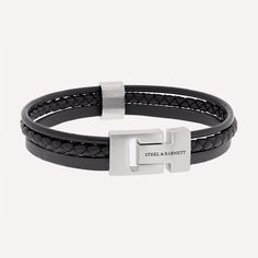 The "Casual Cole" bracelet is a testament to minimalist design and quality craftsmanship. It features three different styles of soft, genuine leather cords, bound together by a sleek Stainless Steel slider, ensuring a comfortable fit. The signature stainless steel clasp, engraved with the STEEL & BARNETT logo, offers a secure closure and a subtle nod to the brand's attention to detail. Perfect for the man who values a clean, composed look paired with the timeless appeal of leather. - WIDTH: 12 m Modern Black Braided Bracelets For Everyday, Modern Black Braided Bracelet For Everyday, Everyday Black Leather Braided Bracelet, Modern Adjustable Double Band Bracelets, Everyday Black Braided Bracelet With Leather Strap, Modern Adjustable Braided Bracelets For Everyday, Modern Leather Bracelet With Black Band, Modern Black Leather Bracelet For Everyday Use, Modern Black Leather Bracelet For Everyday