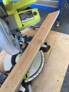 a piece of wood that is being cut with a circular sawtoother and other tools