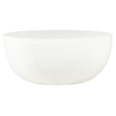 a white bowl sitting on top of a table