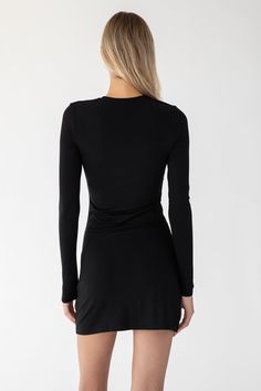 Meet the Karen mini dress, named after 90's bombshell Karen Mulder. Made out of the softest modal fabric and featuring extra long sleeves and fitted body, you will find your self not only comfortable but very chic. If you were a fan of the Mulder Dress then you will love the Karen. Black - 90% Viscose / 10% Spandex. Hand wash and lay flat too dry. Darina is 5'11 / 180 cm and wearing a size 1 which is equivalent to a small. This style is for PRE ORDER and will be shipping between December 16th - Karen Black, Karen Mulder, Modal Fabric, Extra Long Sleeves, Extra Long, Timeless Pieces, Lay Flat, Pre Order, Hand Wash