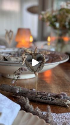 a wooden table topped with plates filled with food