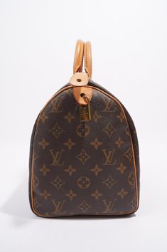 Brand: Louis VuittonStyle: Speedy BagSize: 30Width: 30cmHeight: 21cmDepth: 17cmHandle Drop: 8.5cmExterior Condition: ExcellentInterior Condition: Very GoodColour: MonogramInterior Colour: BrownHardware Colour: GoldMaterial: CanvasProduct Code: TR2160Manufactured In: FranceComes With: Original DustbagDelivery 5-8 or 10-15 working days Please note that during high season and Sale period, delivery times may be affected We accept payment with a Credit card, Debit card, or PayPal.Note: Our Items are Speedy 30 Louis Vuitton Bag, Speedy Bag, Vintage Monogram, School Bags For Kids, Vintage Louis Vuitton, Diamond Quilt, Louis Vuitton Speedy, Sierra Leone, Vintage Chanel