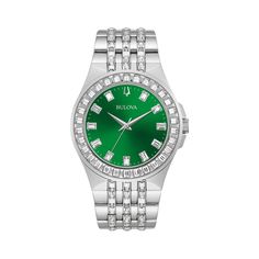 The crystal Phantom from Bulova is a statement timepiece designed to stand out. It features a stainless steel silver-tone case, and 89 authentic baguette shaped crystals. The rich emerald color dial makes a bold statement, finished off with a silver-tone stainless steel bracelet. It features a three-hand quartz movement, and it is designed for those who are looking to make a bold fashion statement style, evoking a luxurious look. Luxury Silver Watch With Stainless Steel Clasp, Luxury Diamond Watch With Rectangular Stainless Steel Dial, Silver Crystal Watch With Round Dial, Luxury Stainless Steel Quartz Watch, Bulova Crystal Watch, Casio Digital, Timepiece Design, Watch Trends, Emerald Color