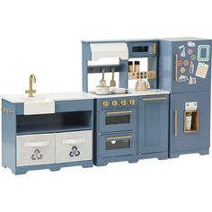 a toy kitchen with blue cabinets and white counter tops, including a sink and oven