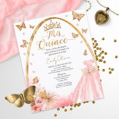 a pink and gold princess birthday party with butterflies on the side, including a tiara