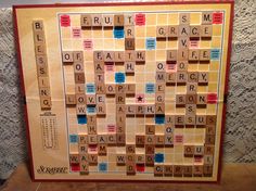 a scrabble board with words written on it