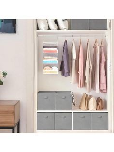 an organized closet with clothes and shoes hanging on the wall, next to a dresser