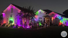 a house decorated with christmas lights and decorations