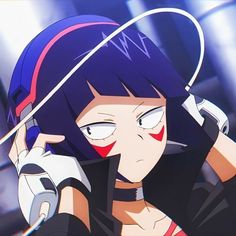 an anime character holding a cell phone up to her ear and looking at the camera