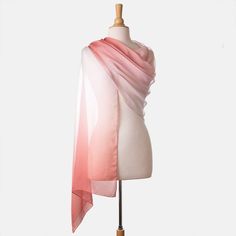 There's nothing like an Italian silk wrap to add a touch of chic elegance to your look.This gossamer-light silk chiffon wrap will add classic femininity to your look, effortlessly complementing any ensemble with grace and charm.A flowing sheer color ombré from peach blossom pink to white. Details Generous size: Approx. 27” x 78” (70 x 200cm). This wrap can be worn as an elegant evening shawl and as a daytime scarf. A timeless addition to your wardrobe. 100% silk chiffon: A luxurious, gossamer-li Silk Shawl For Spring Formal Events, Silk Shawl For Spring Formal Occasions, Silk Shawl For Formal Spring Events, Spring Formal Silk Shawl, Spring Wedding Silk Shawl, Feminine Silk Scarf For Summer, Elegant Sheer Silk Scarves, Elegant Silk Shawl Scarf For Summer, Elegant Silk Chiffon Scarf For Summer