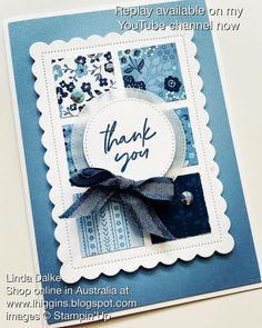 a thank you card with blue and white designs