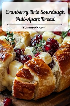 cranberry brie sourdough pull - apart bread on a cutting board