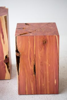 two pieces of wood sitting next to each other