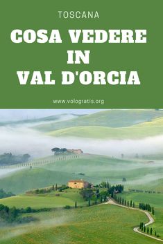 the countryside in italy with green hills and fog