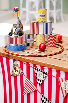 circus themed birthday party decorations on a wooden table