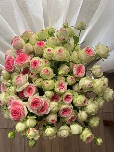 a bunch of flowers that are sitting on a table