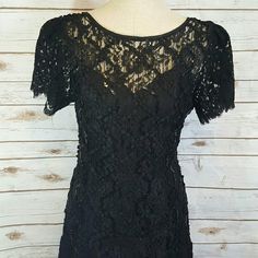 Fully lined (attached slip) black dress with lace overlay and sequin embellishments.  Fitted to thighs and then flares out.  Excellent condition.  1980's.  Bust- 17" flat Waist- 16" flat  Hips- 19" flat  Length- 48"  Tag says 12, but fits the 6/8 mannequin perfectly. Formal Fitted Evening Dress With Lace Work, Fitted Lace Dress With Lace Patchwork For Evening, Fitted Lace Patchwork Evening Dress, Lace Evening Dress With Lace Trim For Party, Fitted Lace Patchwork Dress For Evening, Evening Dresses With Lace Work, Fitted Lace Dress For Party, Fitted Lace Top Dress For Party, Fitted Lace Back Dress For Evening