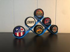 four different types of beer coasters sitting on top of a table