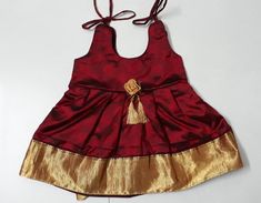 Baby girl grand silk frock golden border gives a grand look. This dress is idle for your angel's naming/cradle ceremony Your little one will look gorgeous in this if she wears it for wedding or for any other social occasion/function. Refer size chart ( skirt length ) and select the appropriate size required Product colour may slightly vary due to photographic lighting sources or your device settings. This has cotton inner lining which makes it comfortable even if she wears it for the whole day. Baby Girl Dresses Indian, Indian Baby Girl, New Born Baby Girl, Cradle Ceremony, Diwali Dresses, Pattu Pavadai, Girls Party Wear, Indian Baby, India Dress