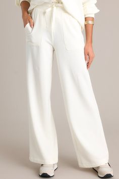 Jump into comfort with Z Supply's Sea Salt White Layover Modal Fleece Pant. Made with soft modal fleece. these pants are perfect for lounging or running errands. With a relaxed fit and stylish design. you'll never want to take them off (seriously. we don't blame you). These white fleece pants feature a high waisted design. an elastic waist band with a self-tie drawstring. deep hip pockets. a soft fleece material and a straight leg.  97% Modal & 3% Spandex  Unlined  Machine Wash Cold Manufactured in China Designed in The USA  Model is Wearing a size X-Small Preppy Girls, Rush Dresses, Cardigan Crop Top, China Design, White Fleece, Concert Looks, Cardigan Crop, Dress Bra, Friend Outfits