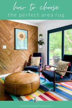 a colorful kitchen reveal with two chairs and a footstool in front of a wood paneled wall