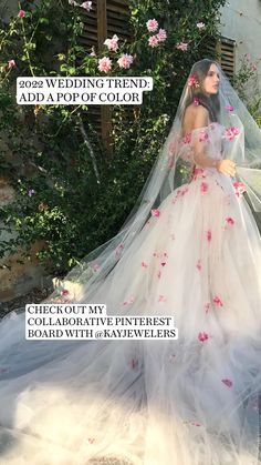 a magazine cover with a woman in a wedding dress and veil on her head, surrounded by flowers