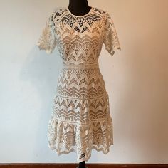 Elegant Ivory/Cream Lace Overlay Dress, Size Small. Attached Nude Slip Lining. Sheer Angular Scalloped Sleeve And Hemline. Back Zipper. Stunning, Beige Scalloped Lace Dress, Beige A-line Midi Dress With Lace Trim, Cream Lace V-neck Mini Dress, Cream V-neck Mini Dress With Lace Trim, Black And White Flannel, Ivory Lace Dress, Vintage Beige Scalloped Lace, Flair Dress, Lace Overlay Dress