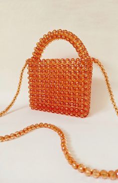 "Crystal bead bag, Bead shoulder bag, Women Bead bag, Bead Bag, Pink Bead bag, Brown Crystal Bead Bag, Orange Crystal Bead bag, Women handbags, Bead Bag Vintage Dimensions - Width: 5,51\" (14 cm.) - Height: 6,69\" (17 cm.) - Depth: 1,96'' (5cm.) My bags are 100% handmade.This size making it perfect to hold your keys, cards, money. I hope you collect great memories with this bag. All items are made in a clean, smoke-free home SHIPPING - This clutch is made and ready to ship - Ships worldwide from İstanbul, Turkey - Processing time prior to shipping is 1-3 days - The shipping time is 5-7 working days for the whole world. Feel free to contact me for any question, by hitting the \"Message the seller\" button at the end of this page" Beaded Shoulder Bag As Fashion Accessory, Beaded Crossbody Bag For Summer, Beaded Rectangular Bag For Fashion Accessory, Summer Beaded Crossbody Bag, Rectangular Beaded Bag For Fashion Accessory, Everyday Beaded Shoulder Bag, Rectangular Beaded Bag As Fashion Accessory, Beaded Shoulder Evening Bag, Rectangular Summer Bags With Colorful Beads