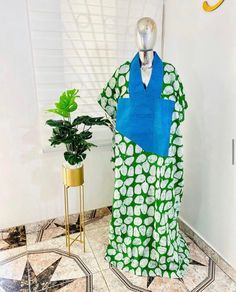 Show up to any event or party with this tribal Nigerian Mix Match dress rich in African Heritage & handwork. Made from premium Adire Cotton fabric. A fabric that is hand dyed in Nigeria. This African Kampala Kaftan can be worn as : Asoebi Dress, Wedding Dress, Bridesmaids Robe Bubu, Church outfits, Dinner, Girls day out, etc ✴️ DETAILS - Loose fit - Silhouette: Oversize & free - Length: 60 inches (can be adjusted shorter to your desired length) - At the neck we have a contrasting cotton fabric. Green Floor-length Maxi Dress For Traditional Ceremonies, Traditional Green Dress With Kimono Sleeves, Green Bohemian Dress With Traditional Patterns, Traditional Green Free Size Dress, Green Bohemian Kaftan For Traditional Ceremonies, Summer Maxi Kaftan For Traditional Ceremonies, Traditional Green Batik Print Kaftan, Green Batik Print Kaftan, Traditional Green Kaftan With Batik Print