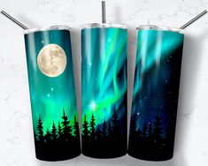 three insulated tumbles with the image of an aurora bore in front of a full moon