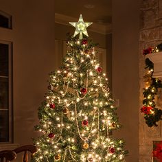 a lit christmas tree in a living room