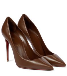 One of Christian Louboutin's most iconic creations, the Kate pumps are designed to enhance the foot's natural arch. From the label's Nudes range, this nappa leather pair is presented in caramel brown â" the sixth shade from the collection. Point toes and 100 mm heels create a seductive silhouette, but it's the signature lipstick-hued soles that have the scene-stealing power. | Christian Louboutin Kate 100 leather pumps Louboutin Kate 100, Christian Louboutin Kate 100, Louboutin Online, Louboutin Kate, Christian Louboutin Kate, Dr Shoes, So Kate, Caramel Brown, Brown Heels