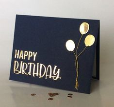 a birthday card with gold foil balloons on it