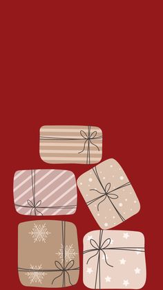 several wrapped presents on a red background