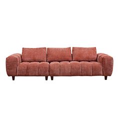 a red couch sitting on top of a white floor