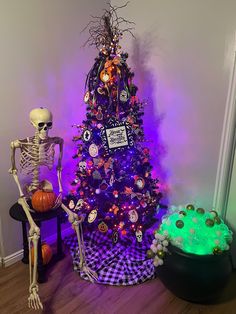 a decorated christmas tree with skeleton decorations