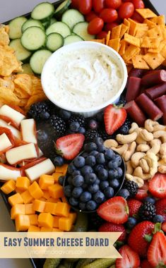 an easy summer cheese board with fruit and crackers