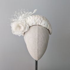 THIS ONE IS MADE TO ORDER IN IVORY OR YOUR CHOICE OF COLOR ☀ Follow this link for more beautiful choices from 'Indigo Hats' https://www.etsy.com/shop/IndigoHats ☀ GRACE - Bandeau in Ivory This stylish hat looks fabulous on - and is so light and easy to wear. I hand blocked this sophisticated bandeau shape, covered it in silk and then in this gorgeous acanthus leaf design with dainty sequins.   I added a lovely matching wild silk rose from England to give it a vintage feel, the matching ivory vei Adjustable Wedding Headband Costume, Wedding Costume Hats And Headpieces With Handmade Flowers, White Mini Hat Headband For Ceremony, Wedding Headband Hat With Handmade Flowers, Elegant Wedding Hats And Headpieces With Handmade Flowers, Elegant Cream Headband Costume, Fitted Wedding Hat With Round Crown, Elegant White Round Crown Headpiece, Adjustable White Headpiece For Ceremony