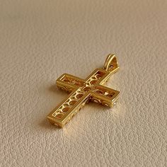 Cross made of 18 ct. yellow gold with natural diamonds On the Cross there is 11 diamonds weighing 0.14 ct. each and a diamond on the hanger weighing 0.04 ct. The total weight of all the diamonds is 1.58 ct. They are natural diamonds ( Not man made diamonds ) Color grade of the stones is J-K and clarity grade VS I It's an elegant handmade Cross made in Greece in our workshop in Athens. Ideal for Baptism, Engagement Anniversary, and any other special occasion ( The price does not include the chain Ancient Greek Coin, Knit Bracelet, Clip On Charms, Diamond Color Grade, Coin Ring, Man Made Diamonds, Gold Plated Bracelets, Engagement Anniversary, Diamond Fashion