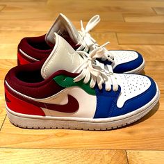 Air Jordan 1 Low (Blue, Red, Maroon, Green, And White). Rare Colors And You Won’t Find A Lot Of These Color Styles. Used But Still In Great Condition. Only Worn Area Is The Bottom Of The Shoe. Everything Else About The Shoe Looks And Feels New. (Look At Pictures) No Box But Will Ship In Nice Packaging. Feel Free To Message Me If You Have Any Questions Multicolor Low-top Jordan Sports Shoes, Blue Low-top Custom Sneakers With Red Sole, Blue Low-top Sporty Jordan Shoes, Blue Low-top Jordan Shoes, Royal Blue Low Jordans, Air Jordan 1 Low Blue, Jordan 1 Low Blue, Nice Packaging, Rare Colors