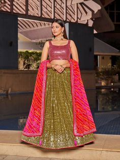 Elevate your style with this exquisite designer embroidered lehenga choli. The lehenga is crafted from luxurious georgette fabric and adorned with stunning sequins, zari, and thread embroidery. With a length of up to 42 inches and a 4-meter flair, it offers a grand appearance. The choli, also made from georgette, features intricate embroidery on both sides and is unstitched, allowing for a custom fit. Complementing the ensemble is a 2.5-meter chinon dupatta with digital prints and matching embroidery. Weighing just 2 kg, this semi-stitched set can be enhanced with a cancan for added volume.

#DesignerLehenga #EmbroideredLehenga #SequinsWork #ZariEmbroidery #GeorgetteLehenga #BridalFashion #TraditionalWear #IndianFashion #ChinonDupatta #EthnicWear #WeddingOutfit Pakistani Bridal Lehenga, Pakistani Lehenga, Georgette Lehenga, Party Wear Lehenga Choli, Choli Designs, Pink Lehenga, Party Wear Lehenga, Bridal Lehenga Choli, Zari Work