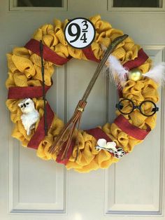 a harry potter wreath on the front door