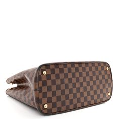 This is an authentic LOUIS VUITTON Damier Ebene Kensington. This chic tote is crafted of signature damier toile checkered canvas. This shoulder bag features brown rolled leather handles and a polished gold cut out V at the top center. The top opens to a partitioned microfiber beige interior with a central zipper compartment. Beige Interior, Louis Vuitton Totes, Louis Vuitton Damier Azur, Bowling Bags, Louis Vuitton Shoulder Bag, Louis Vuitton Damier Ebene, Damier Ebene, Weekender Tote, Leather Handles