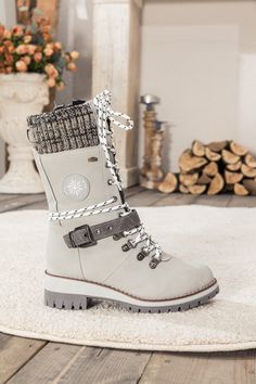 Combat the cold with these snow-ready boots equipped with cozy ribbed cuffs and chic buckled straps. 1.72'' heel 12.6'' circumference 11.8" Shaft Zip closure Man-made upper Man-made lining Man-made footbed Man-made midsole Rubber sole Reindeer Headband, Boot Straps, Sorel Winter Boot, Daily Dress, Dress Jewelry, Boots For Sale, Knit Jumper, Accessories Necklace, Ugg Boots