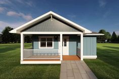 a small blue and white house in the middle of a grassy area with a walkway leading to it