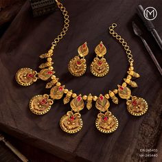 Delicately-crafted to embody your grace and resilience.  Adorn yourself in a creation where tradition blends seamlessly with exquisite craftsmanship, capturing the spirit of who you are—a story that shines with every sparkle.  Discover the art of elegance at your nearest Malabar Gold & Diamonds showroom today!  SKU code for necklace: NK-245440 SKU code for earrings: ER-245455  #SwarnakritiCollection #GoldJewellery #IntricateDesigns #MalabarGoldandDiamonds Royal Necklace, Gold Necklace Designs, Victorian Jewelry, Gold Jewellery Design, Gold Jewellery, Necklace Designs, The Spirit, Gold Diamond, Showroom