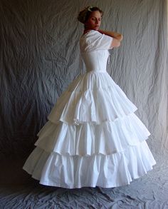 ruffle Fitted Victorian Ball Gown For Debutante Ball, Historically Designed Fitted Dress, Victorian Fitted Ball Gown For Wedding, Elegant Fitted Ball Gown With Crinoline, Elegant Fitted Ball Gown In Crinoline, Marie Antoinette Style Fitted Ball Gown For Debutante Ball, Fitted Victorian Dress For Debutante Ball, Fitted Crinoline Dresses For Debutante Ball, Victorian Fitted Petticoat With Attached Cancan