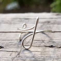 This dainty, j initial ring is adjustable and the perfect way to show some self love, wear as friendship rings with your best buds, give to your bridesmaids as a thoughtful gift they will treasure forever, or to your girlfriend to keep you in her thoughts! Wrapped by hand using nickel free, non tarnish, high quality wire, this letter ring is custom made JUST FOR YOU!-----------------------------------------------MATERIAL: The wire is made out of high quality non-tarnish coated copper wire that i J Initial, Initial J, Jewelry Stamping, Ring Initial, Ring Wire, Friendship Rings, Wire Wrapped Ring, Letter Ring, Personalized Ring